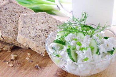 Cottage cheese with cucumber clipart