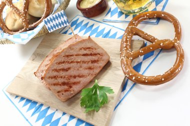 Fresh beef and pork loaf with pretzels clipart