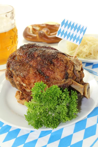 Pork knuckle with sauerkraut — Stock Photo, Image