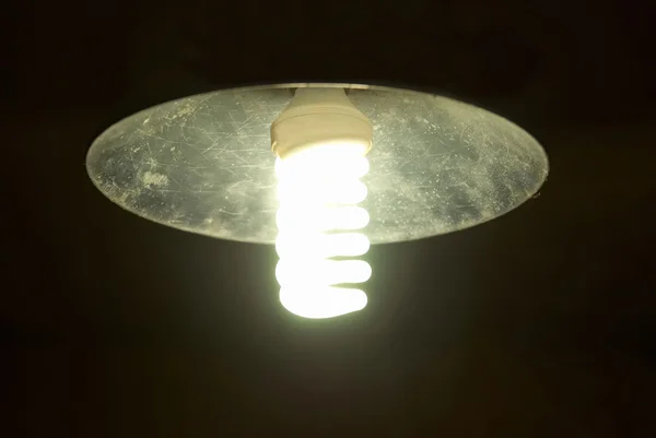 Lampshade with bright energy saving lamp — Stock Photo, Image