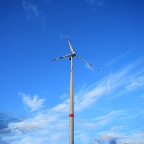 stock image Windmill against blue sky