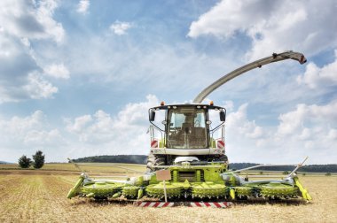 Combine harvester and thresher clipart