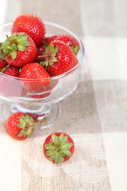 Ripe strawberries in a bowl clipart