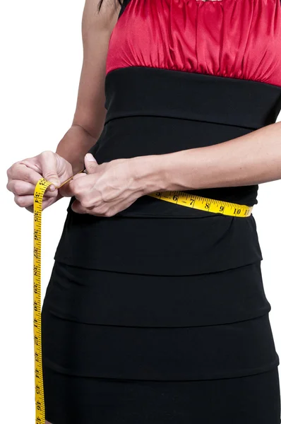 Kvinna som mäter sin midja — Stockfoto