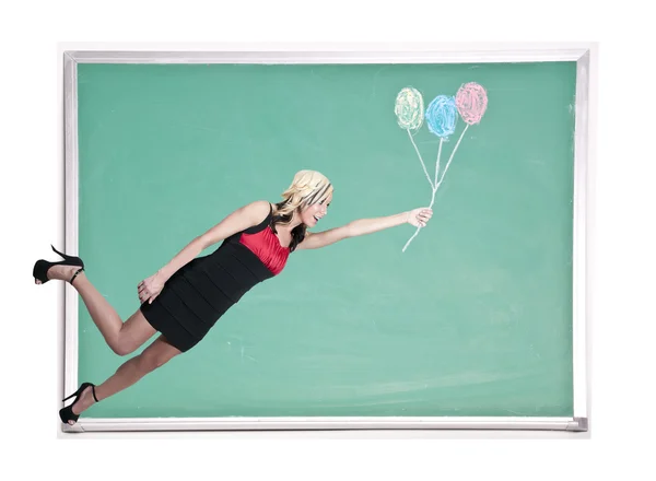 Tebeşir balonlarla yüzen kadın — Stok fotoğraf