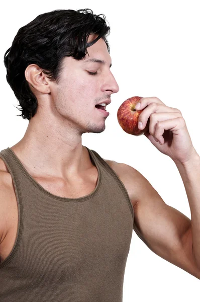 Чоловік їсть яблуко — стокове фото