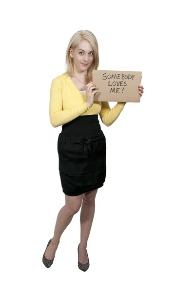 Mujer sosteniendo un signo — Foto de Stock