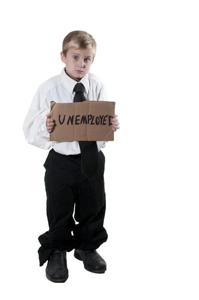 Niño pequeño sosteniendo una señal de desempleo —  Fotos de Stock