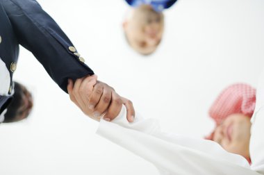 Closeup of business shaking hands over a deal clipart