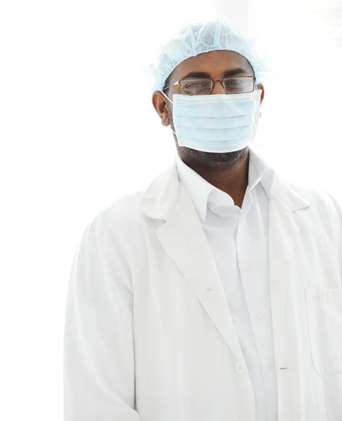 Confident African American male surgeon smiling — Stock Photo, Image