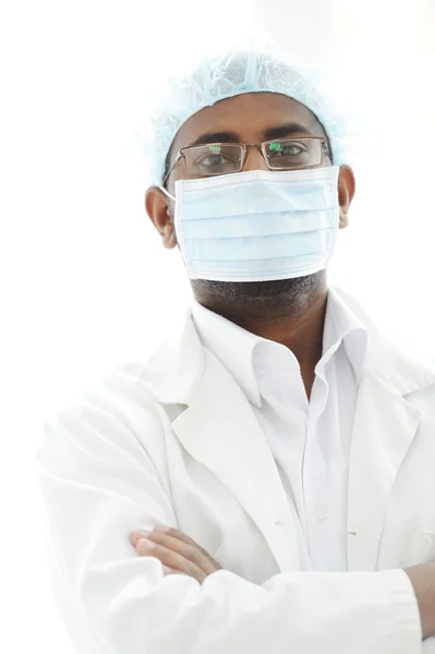 Confident African American male surgeon smiling — Stock Photo, Image