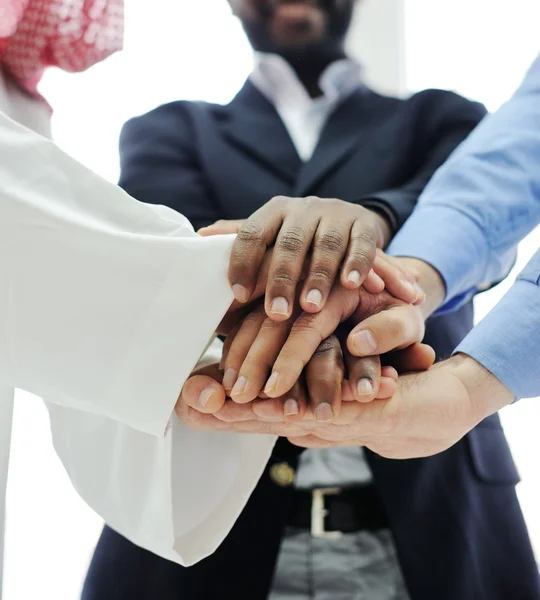 Business team overlapping hands — Stock Photo, Image