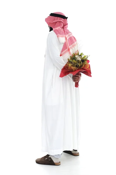 Mellanöstern man gömmer sig bakom en rosor för sin fru — Stockfoto