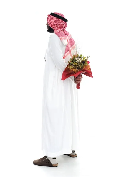 Mann aus dem Nahen Osten versteckt sich hinter einer Rose für seine Frau — Stockfoto