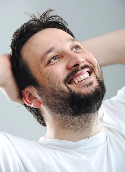 Portrait of young man smiling — Stock Photo, Image