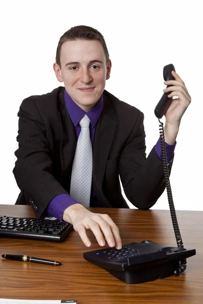 Businessman dialing telephone number — Stock Photo, Image