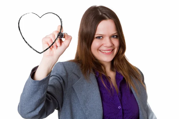 Femme d'affaires dessinant un cœur — Photo