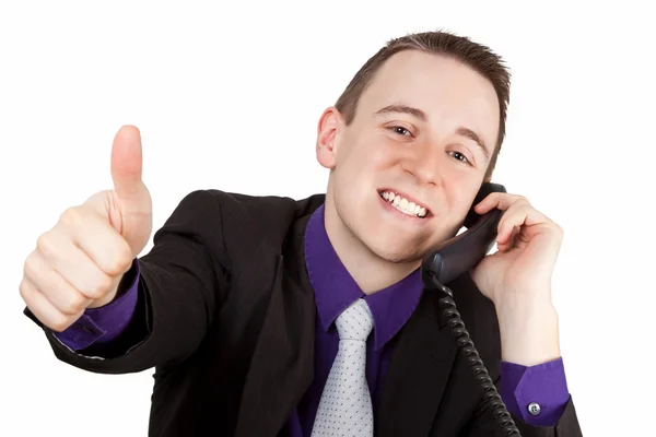 Businessman showing thumbs up Stock Photo