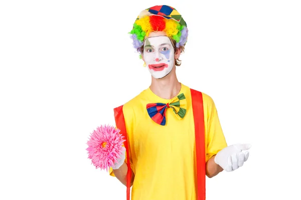 Цирковий клоун з квіткою — стокове фото