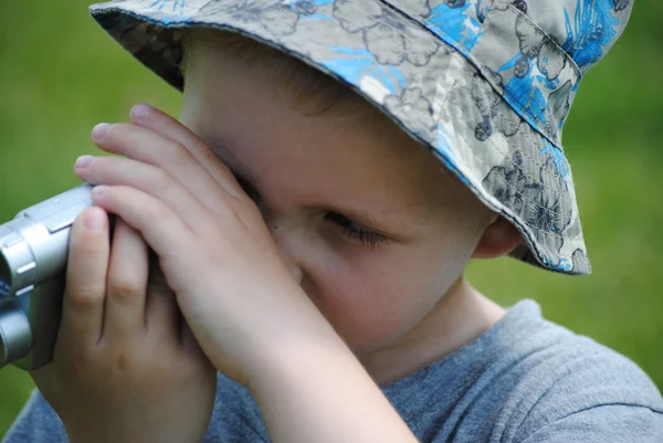 Stock image Child recording with his video camera