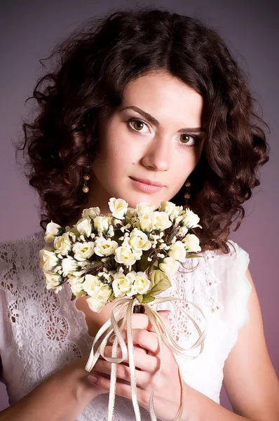 Woman in retro bridal dress with bouquet — Stock Photo, Image