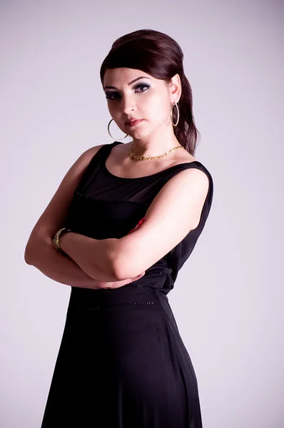 Beautiful woman in black dress — Stock Photo, Image