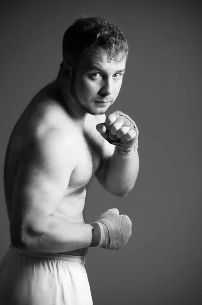 Portrait of boxer on dark background — Stock Photo, Image