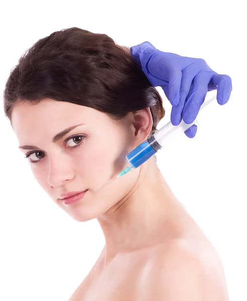 Mulher bonita recebe uma injeção em seu rosto isolado — Fotografia de Stock