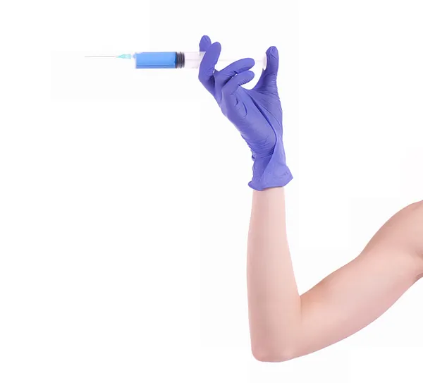 Hand holding syringe isolated on white — Stock Photo, Image