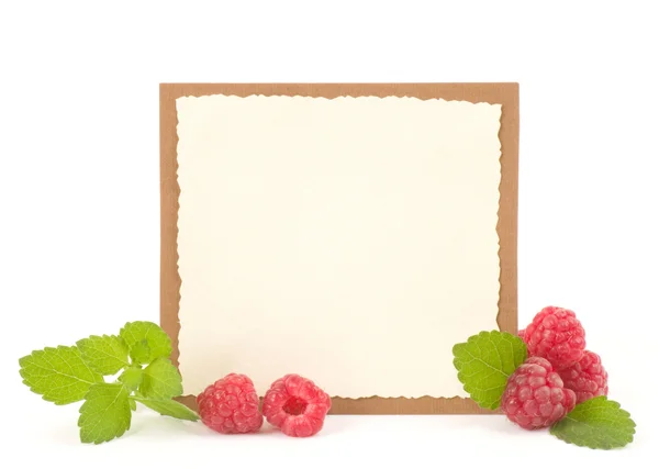 Red fresh raspberry with banner on white background — Stock Photo, Image