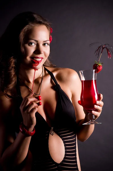 Beautiful sexy woman with strawberry cocktail — Stock Photo, Image