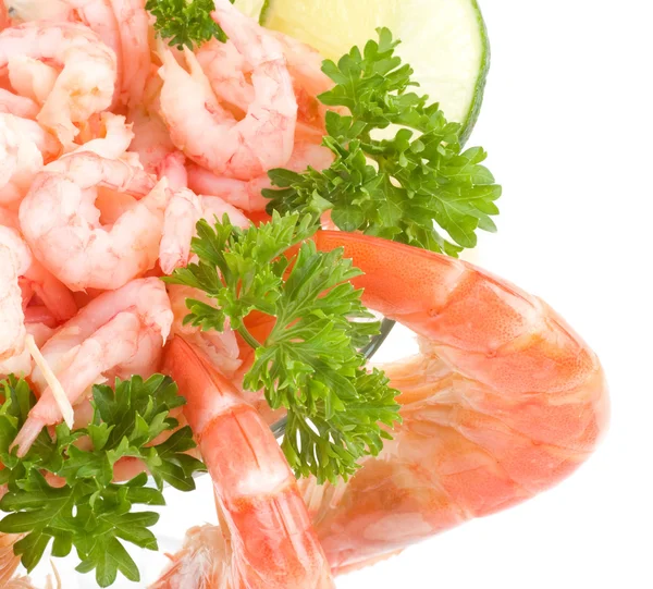 Chilled shrimp served with lime in a martini glass — Stock Photo, Image