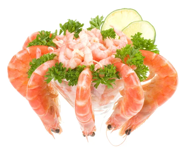 Chilled shrimp served with lime in a martini glass — Stock Photo, Image