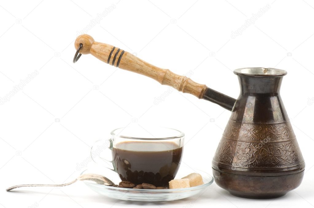 Metal turk and coffee cup isolated on a white background