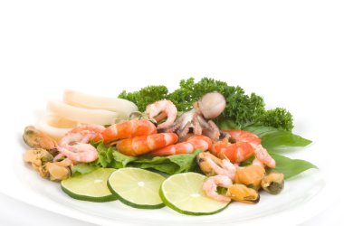 Raw cocktail of seafood with vegetables clipart