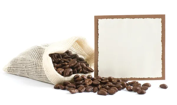 Coffee beans in canvas sack with banner on white background — Stock Photo, Image