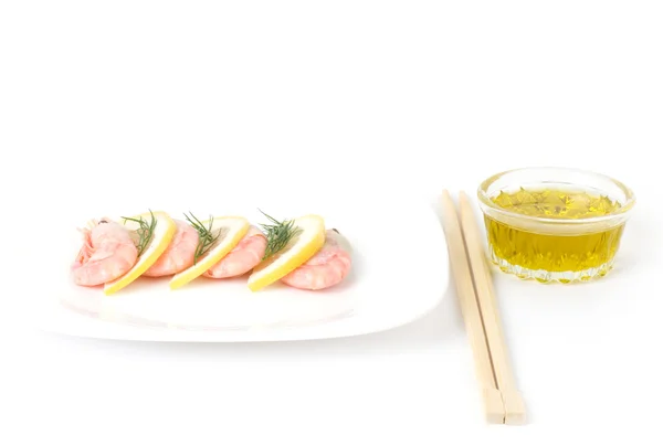 Tasty boiled shrimps on plate on white background — Stock Photo, Image