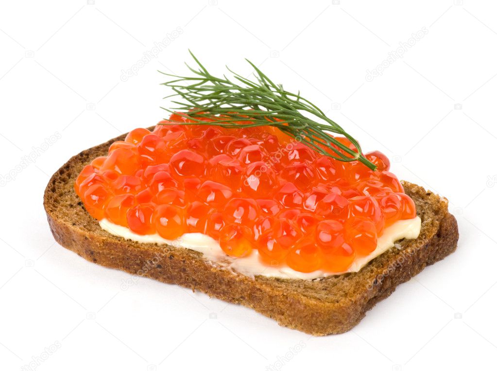 Red caviar with bread and butter on the white background