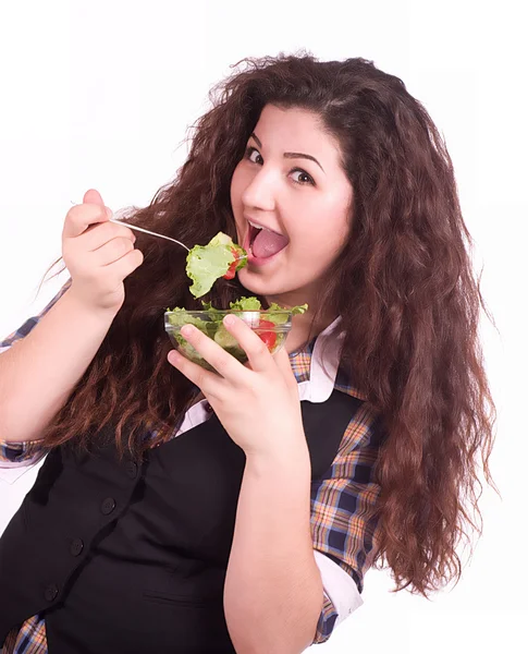 Vacker flicka äter hälsosam mat på den vita bakgrunden — Stockfoto