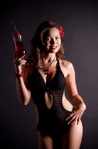 Beautiful sexy woman with strawberry cocktail — Stock Photo, Image