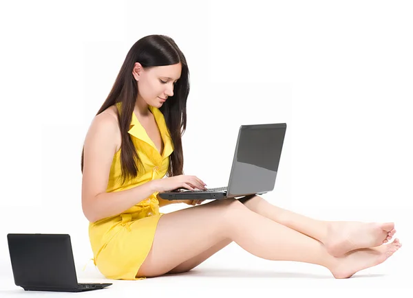 Young female student with computer — Stock Photo, Image