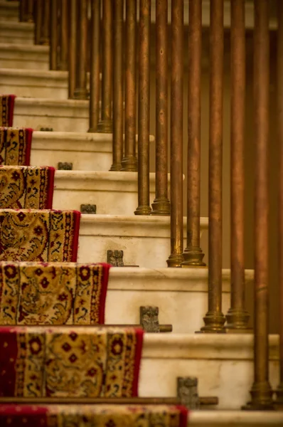 Stairs covered with red carpet — Stock Photo, Image