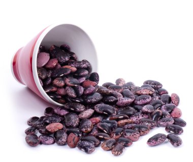 Color kidney beans in a bowl isolated on a white background clipart