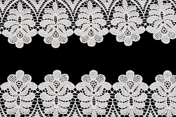 Vintage lace with flowers on black background — Stock Photo, Image