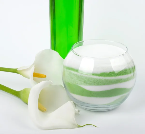 Beauty spa oils, white calla and salt on white background — Stock Photo, Image