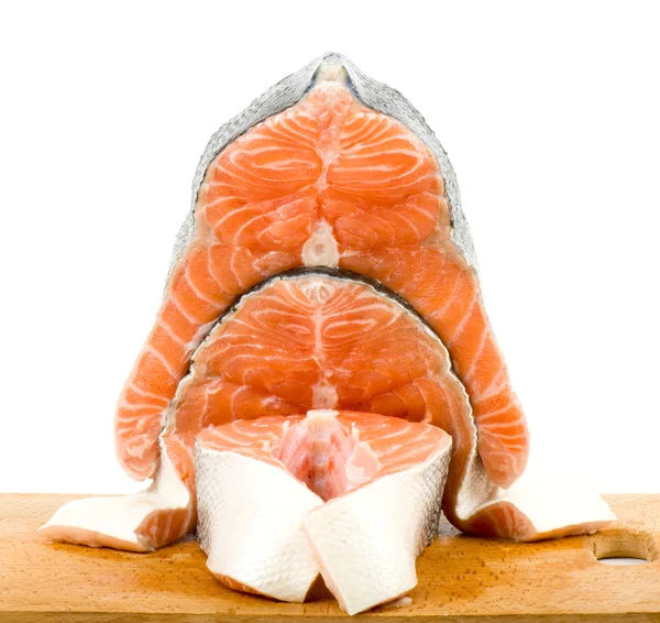Pedaço de um salmão em um fundo branco — Fotografia de Stock