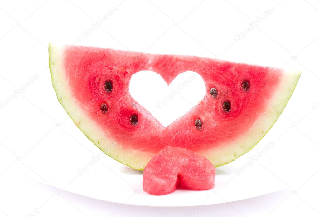 Watermelon with heart isolated on white background