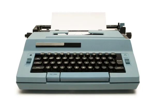 白地に青の電動タイプライター — ストック写真
