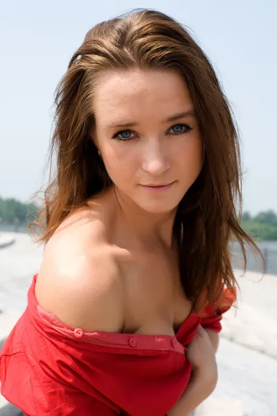 Beautiful girl in red shirt — Stock Photo, Image