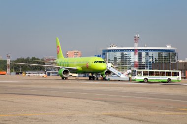 Plane at the airport of Irkutsk clipart